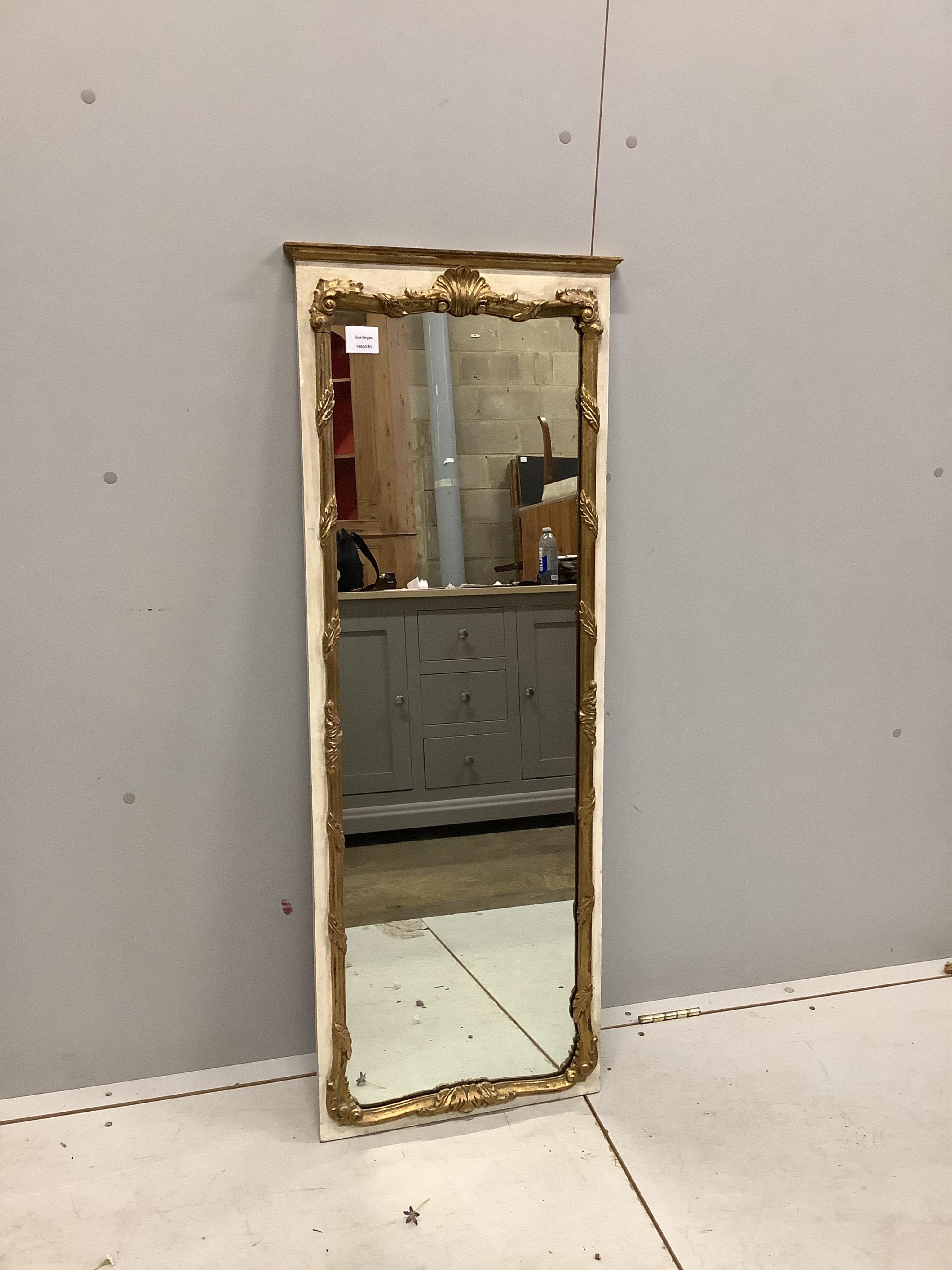 A Louis XVI style cream and gilt wall mirror, width 44cm, height 119cm. Condition - fair